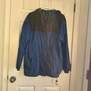 Like new men’s Cabela windbreaker style jacket with hood. Blue/black. Size L